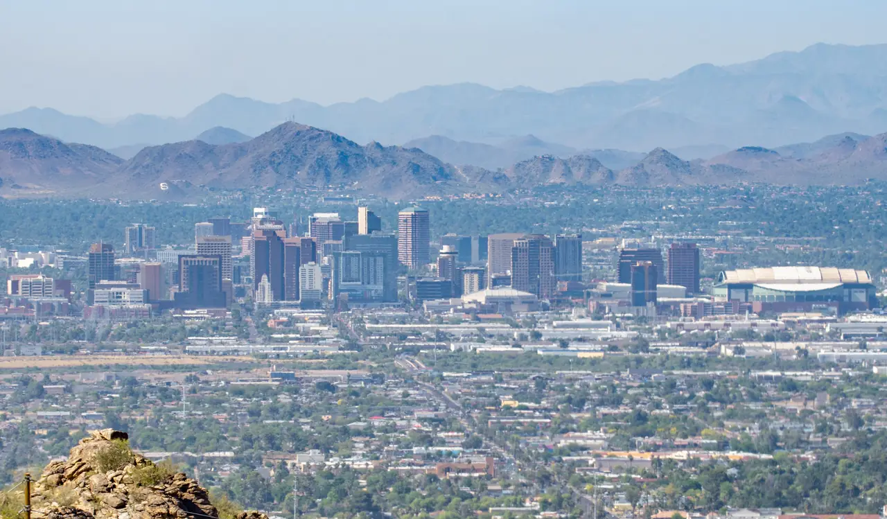 Downtown Phoenix skyline and Chase Field in the Valley of the Sun, with desert mountains behind