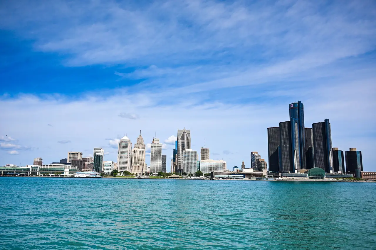 Detroit's skyline and the Renaissance Center across the Detroit River on a bright day